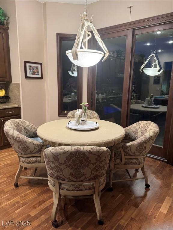 4208 Agosta Luna Pl, Las Vegas, NV 89135 - dining space featuring wood finished floors