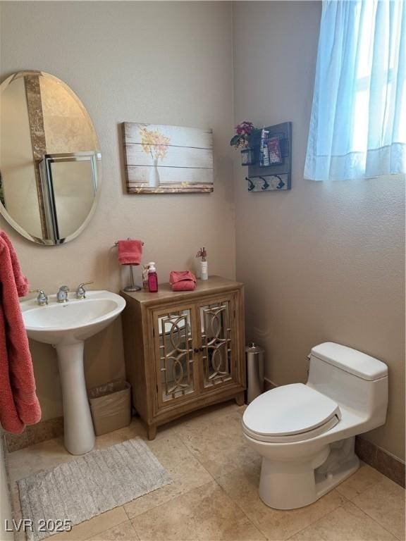 4208 Agosta Luna Pl, Las Vegas, NV 89135 - half bath featuring toilet and tile patterned floors