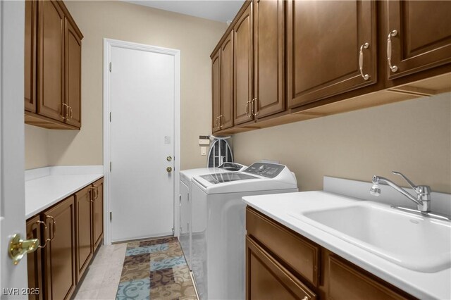 4208 Agosta Luna Pl, Las Vegas, NV 89135 - laundry room with cabinet space and washer and clothes dryer