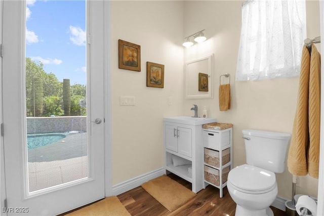 4208 Agosta Luna Pl, Las Vegas, NV 89135 - bathroom with vanity, wood finished floors, toilet, and baseboards