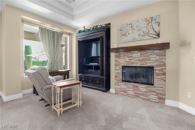 4208 Agosta Luna Pl, Las Vegas, NV 89135 - living area with carpet floors, a tile fireplace, and baseboards