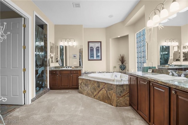 4208 Agosta Luna Pl, Las Vegas, NV 89135 - full bathroom with two vanities and a garden tub