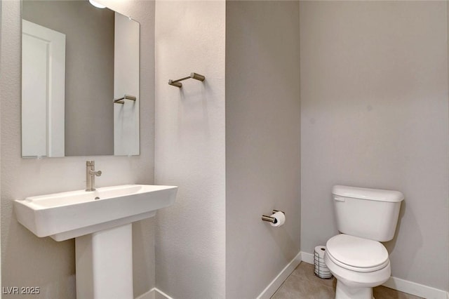 10985 Limeslice Ave Unit 2, Las Vegas, NV 89135 - half bathroom with toilet and tile patterned flooring