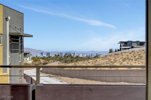 10985 Limeslice Ave Unit 2, Las Vegas, NV 89135 - view of yard featuring a mountain view and a balcony