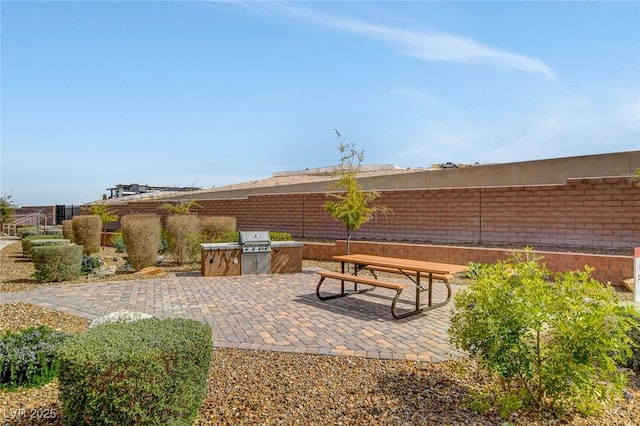 10985 Limeslice Ave Unit 2, Las Vegas, NV 89135 - view of patio with exterior kitchen