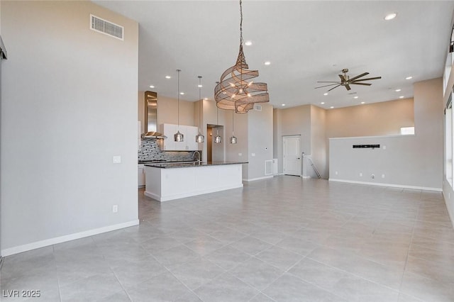 10985 Limeslice Ave Unit 2, Las Vegas, NV 89135 - unfurnished living room featuring ceiling fan, recessed lighting, and light tile patterned flooring