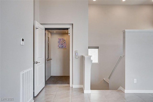 10985 Limeslice Ave Unit 2, Las Vegas, NV 89135 - hall featuring light tile patterned floors and recessed lighting