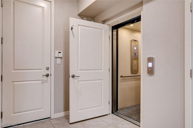 10985 Limeslice Ave Unit 2, Las Vegas, NV 89135 - hall with light tile patterned flooring and baseboards