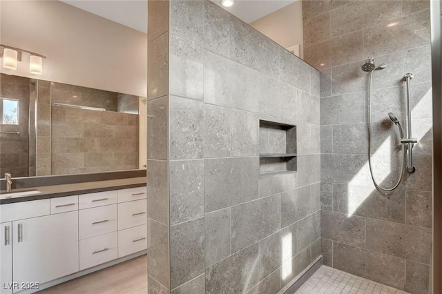 10985 Limeslice Ave Unit 2, Las Vegas, NV 89135 - full bathroom with vanity, a walk in shower, tile patterned floors, and tile walls