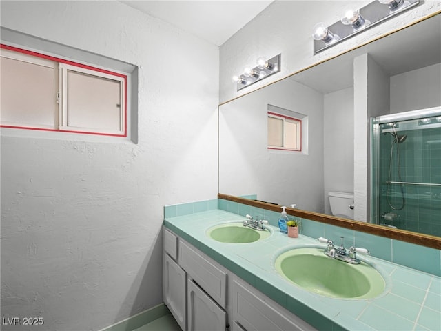 3212 Silver Saddle St, Las Vegas, NV 89169 - bathroom with toilet, an enclosed shower, and double vanity
