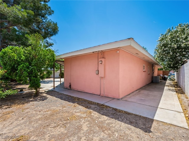 3212 Silver Saddle St, Las Vegas, NV 89169 - view of property exterior with stucco siding and central air condition unit