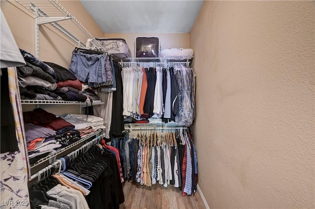 9370 Corkfish St, Las Vegas, NV 89178 - walk in closet with wood finished floors