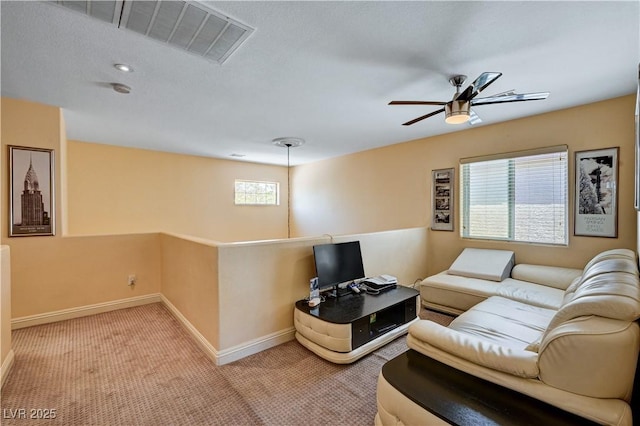 9370 Corkfish St, Las Vegas, NV 89178 - carpeted living area featuring baseboards and a ceiling fan