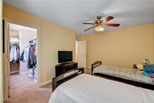 9370 Corkfish St, Las Vegas, NV 89178 - bedroom with light colored carpet, baseboards, a spacious closet, and a closet