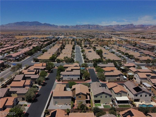 9370 Corkfish St, Las Vegas, NV 89178 - aerial perspective of suburban area with a mountainous background