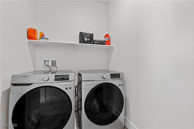 5255 Peak Rock Ct, Las Vegas, NV 89141 - washroom featuring washing machine and dryer and baseboards