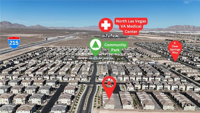 2598 Polar White Ave, North Las Vegas, NV 89086 - aerial view of residential area with a mountain backdrop