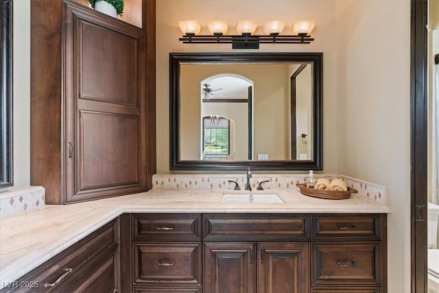 20 Via Paradiso St, Henderson, NV 89011 - bathroom with vanity, ceiling fan, and tasteful backsplash
