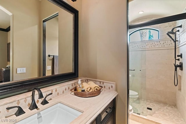 20 Via Paradiso St, Henderson, NV 89011 - bathroom featuring toilet, a stall shower, and double vanity