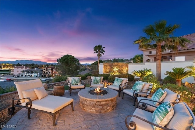 20 Via Paradiso St, Henderson, NV 89011 - view of patio featuring an outdoor living space with a fire pit and a mountain view