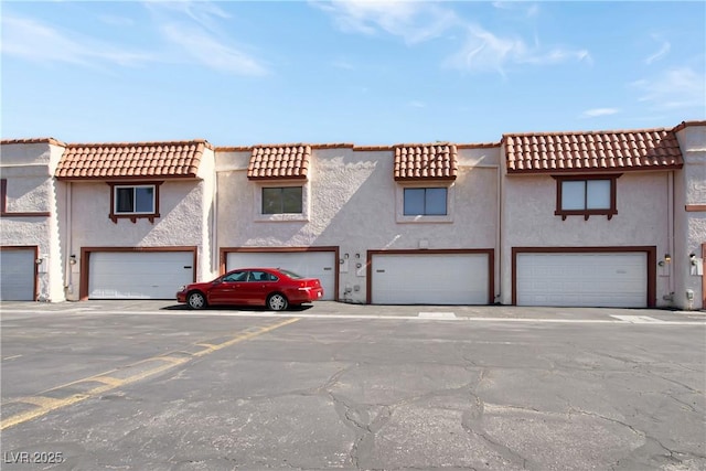 1312 Rawhide St, Las Vegas, NV 89119 - multi unit property featuring a tile roof and stucco siding