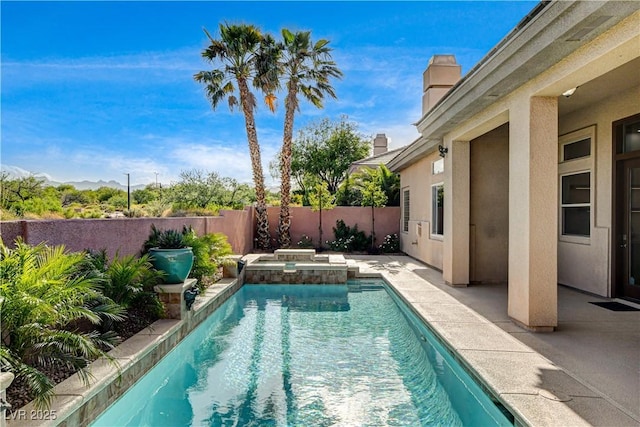 9921 Mirada Dr, Las Vegas, NV 89144 - view of pool featuring a fenced backyard, a patio area, and a pool with connected hot tub