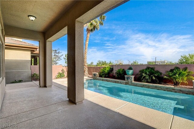 9921 Mirada Dr, Las Vegas, NV 89144 - view of pool with a patio area and a fenced backyard
