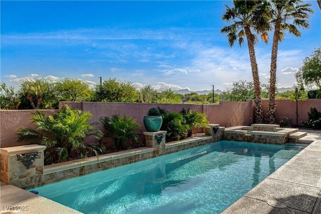 9921 Mirada Dr, Las Vegas, NV 89144 - view of swimming pool featuring a fenced backyard and a pool with connected hot tub
