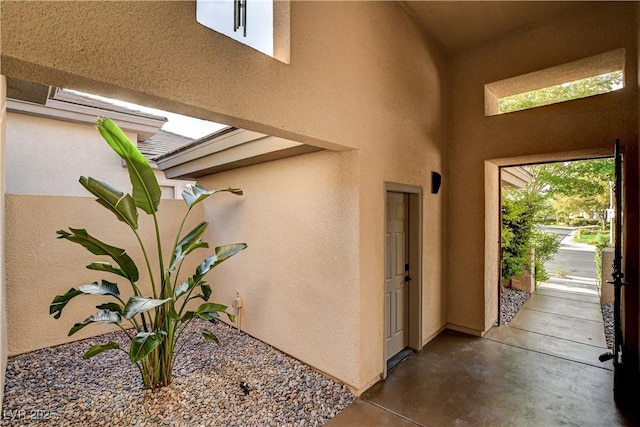 9921 Mirada Dr, Las Vegas, NV 89144 - entrance foyer featuring concrete floors and a high ceiling