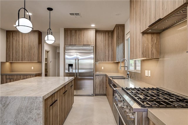 9921 Mirada Dr, Las Vegas, NV 89144 - kitchen with built in fridge, modern cabinets, a sink, and recessed lighting