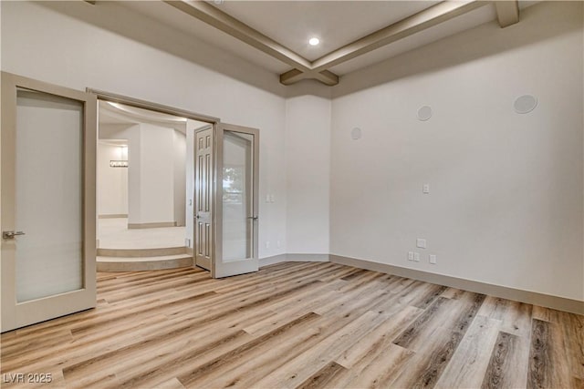9921 Mirada Dr, Las Vegas, NV 89144 - empty room featuring light wood-style flooring, beam ceiling, recessed lighting, and baseboards