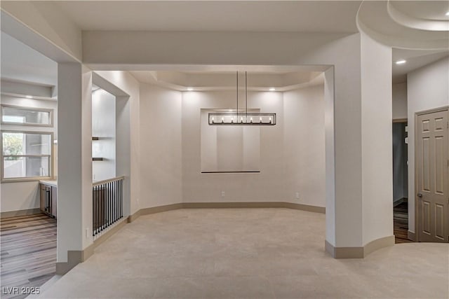 9921 Mirada Dr, Las Vegas, NV 89144 - unfurnished dining area featuring baseboards