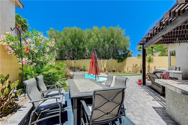 1028 Dodger Blue Ave, Las Vegas, NV 89123 - fenced backyard with outdoor dining area, a patio, and cooling unit