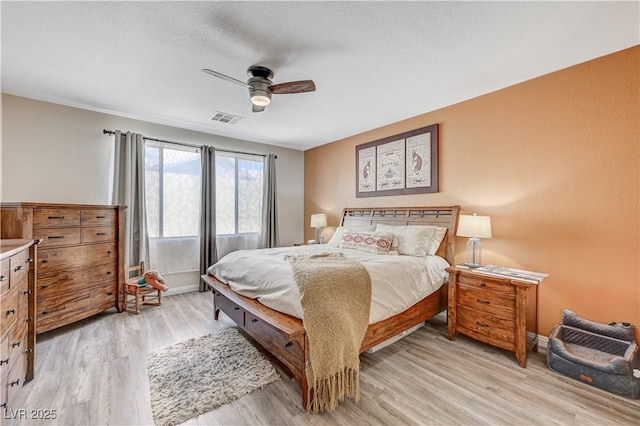 1028 Dodger Blue Ave, Las Vegas, NV 89123 - bedroom with light wood-style floors, baseboards, and ceiling fan