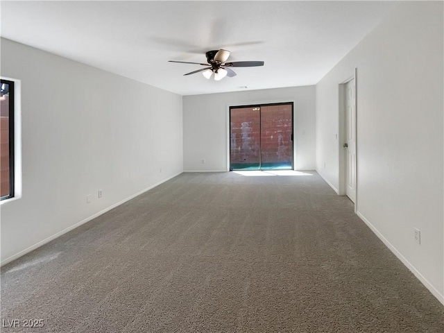 7873 Running Doe Ct, Las Vegas, NV 89149 - carpeted empty room with ceiling fan and baseboards