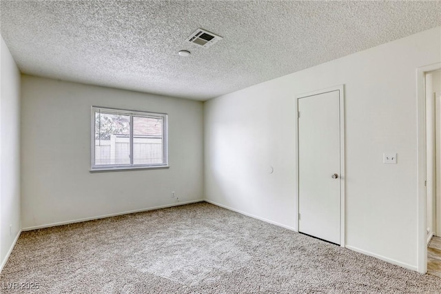1012 Winwood St, Las Vegas, NV 89108 - unfurnished bedroom with carpet, a textured ceiling, and baseboards