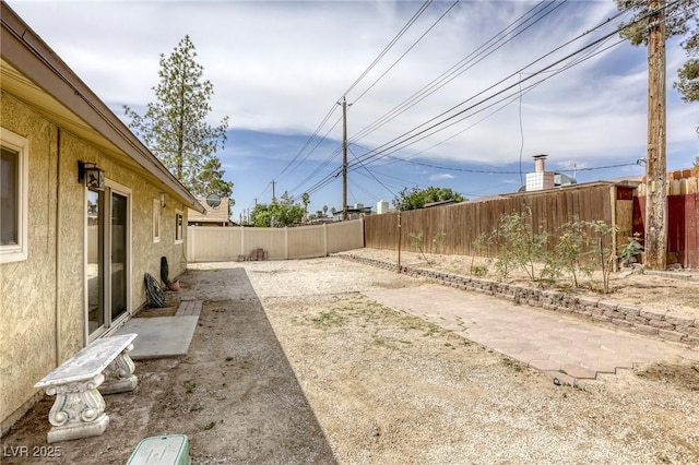 1012 Winwood St, Las Vegas, NV 89108 - fenced backyard with a patio area