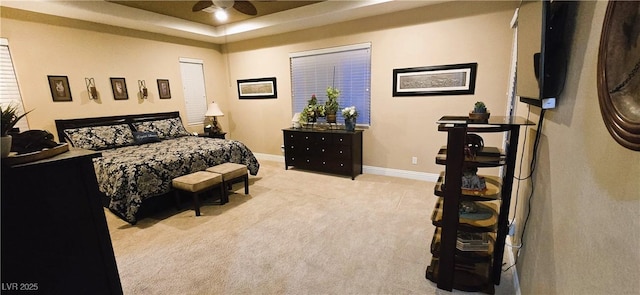 4242 Helena Hideaway Ct, Las Vegas, NV 89129 - bedroom featuring carpet flooring, baseboards, and a tray ceiling