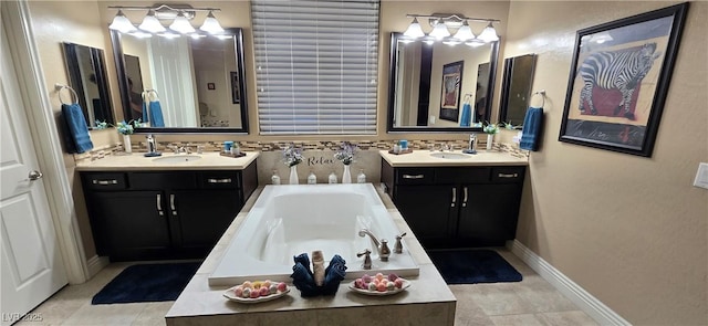 4242 Helena Hideaway Ct, Las Vegas, NV 89129 - bathroom featuring two vanities, a bath, tile patterned flooring, and a chandelier