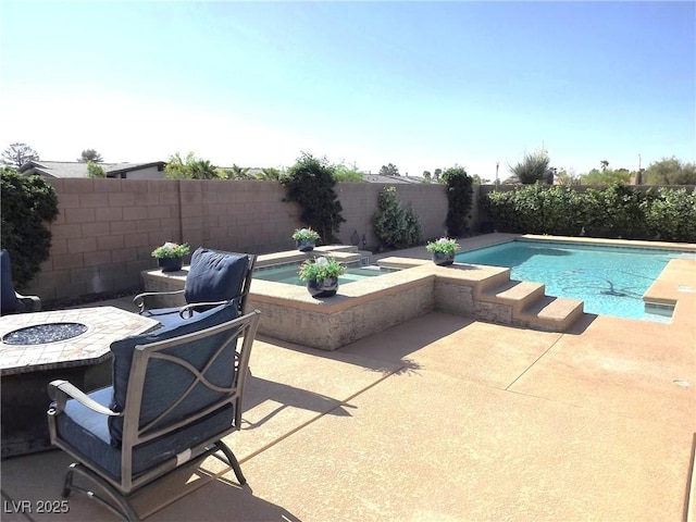 4242 Helena Hideaway Ct, Las Vegas, NV 89129 - view of swimming pool with an outdoor fire pit, a patio area, an in-ground hot tub, and a fenced backyard
