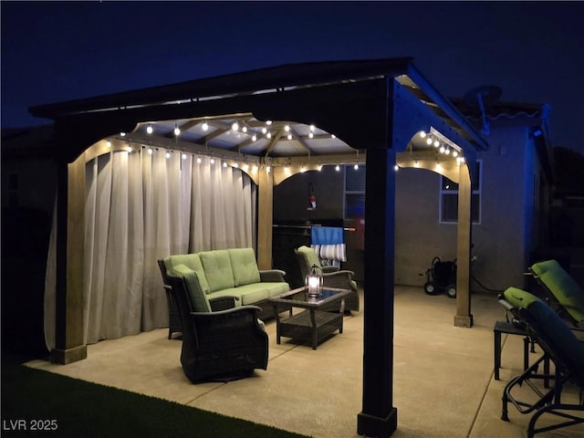 4242 Helena Hideaway Ct, Las Vegas, NV 89129 - patio at night with an outdoor hangout area, a gazebo, and a patio area