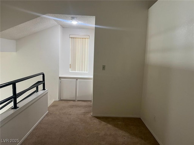 8940 Antioch Way, Las Vegas, NV 89117 - hall featuring carpet, a textured ceiling, and baseboards