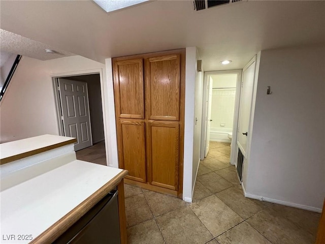 8940 Antioch Way, Las Vegas, NV 89117 - hallway with light tile patterned floors, baseboards, and recessed lighting