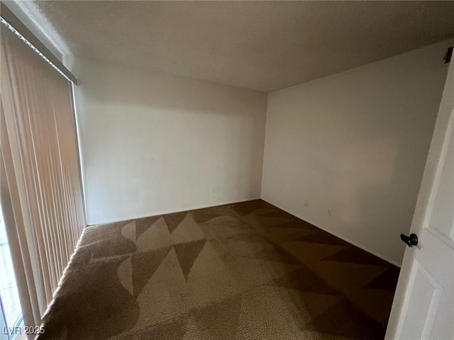 8940 Antioch Way, Las Vegas, NV 89117 - unfurnished room with dark carpet