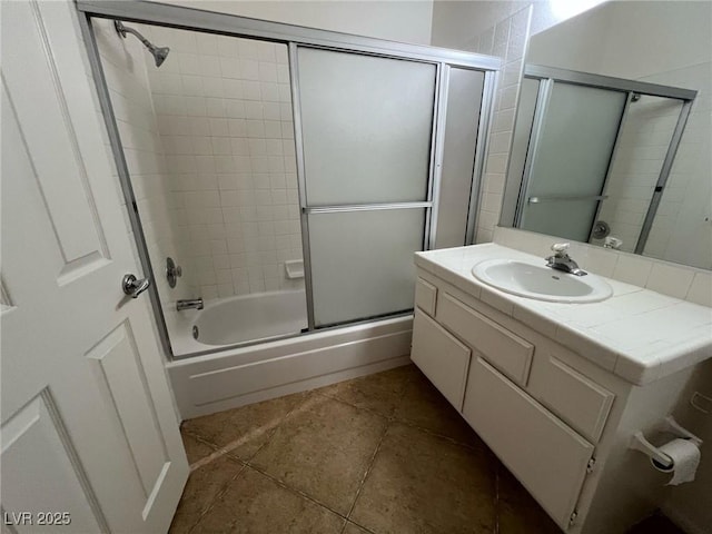 8940 Antioch Way, Las Vegas, NV 89117 - full bath featuring tile patterned flooring, shower / bath combination with glass door, and vanity