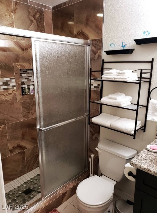 266 Lyra Ln, Las Vegas, NV 89110 - full bathroom with toilet, a stall shower, and vanity