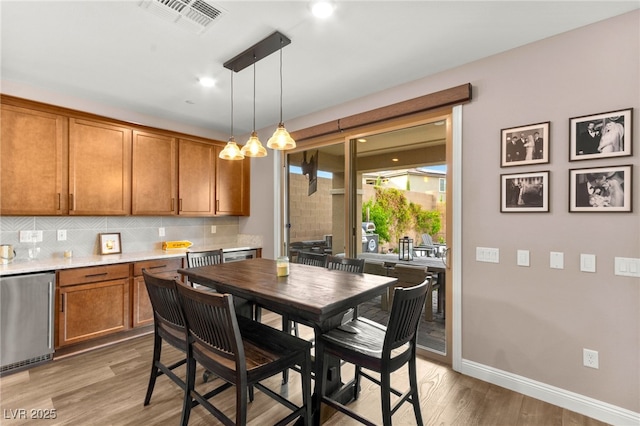 12430 Foxtail Run Ave, Las Vegas, NV 89138 - dining room featuring light wood-style floors, baseboards, and recessed lighting