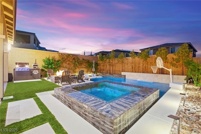 12430 Foxtail Run Ave, Las Vegas, NV 89138 - view of swimming pool featuring an in-ground hot tub, a fenced backyard, and a patio area
