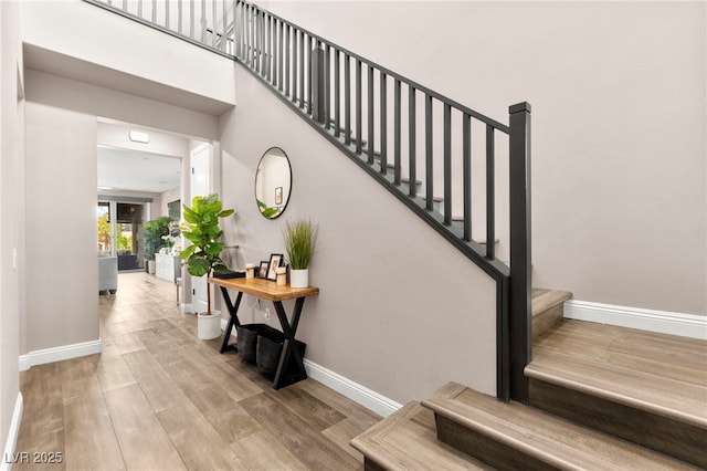 12430 Foxtail Run Ave, Las Vegas, NV 89138 - stairway with wood finished floors and baseboards