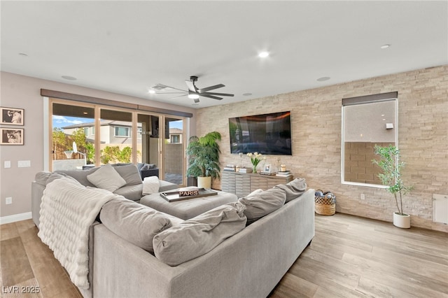 12430 Foxtail Run Ave, Las Vegas, NV 89138 - living area featuring ceiling fan, wood finished floors, baseboards, and recessed lighting